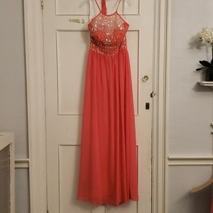 Salmon peach floor length gown.